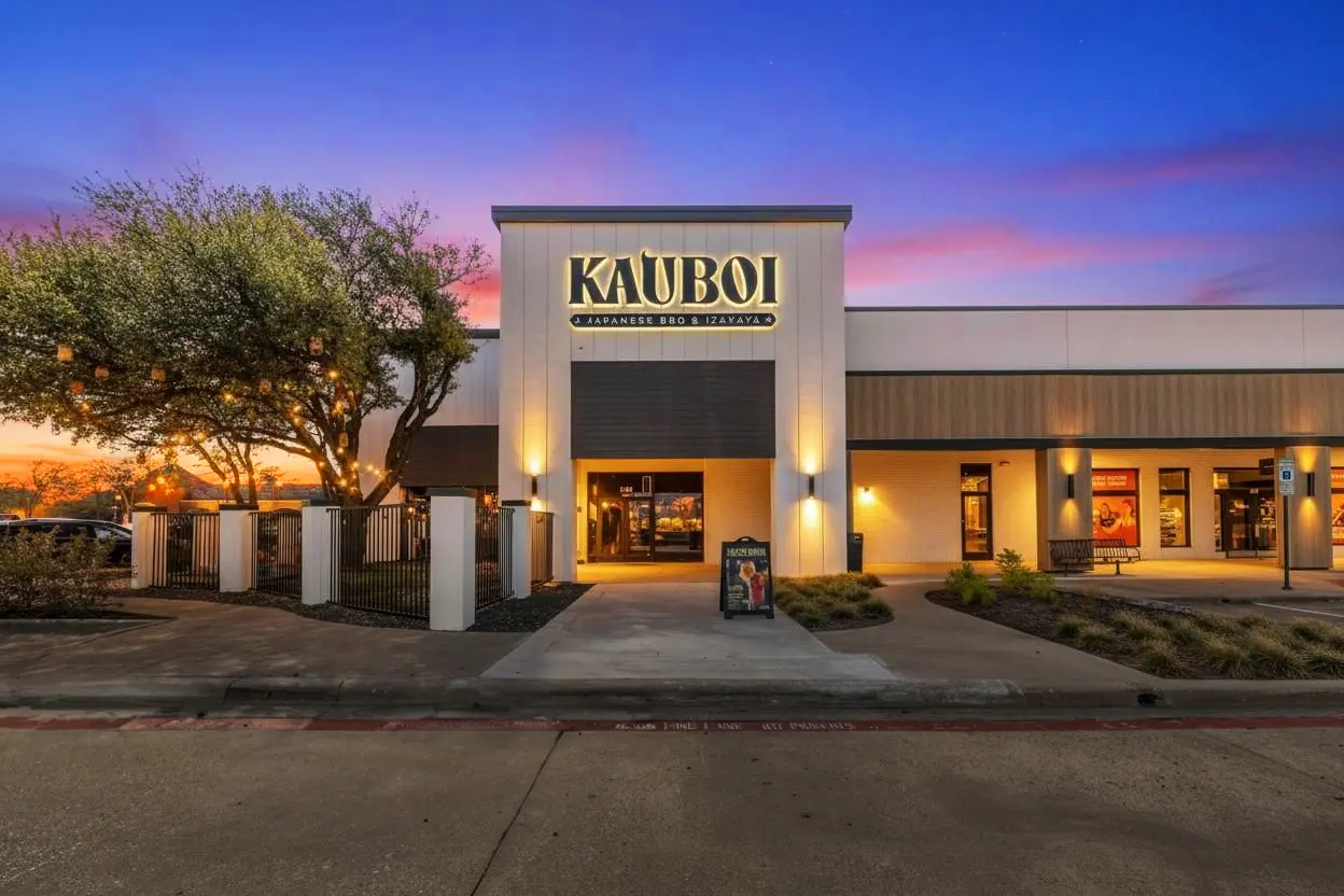 Kauboi BBQ in Plano at dusk — a completed restaurant buildout led from the owner side